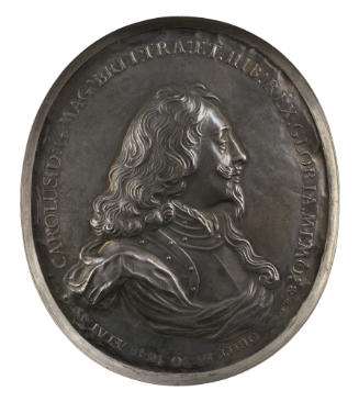 Silver portrait medal of King Charles I in armor (with a soft collar showing at the neck), wear…