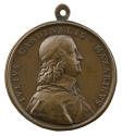Bronze portrait medal of Cardinal Mazarin, hair long and wavy, wearing a calotte, a soft collar…