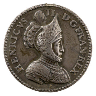 Silver portrait medal of Henri II wearing intricately embossed armor and a plumed helmet; pearl…