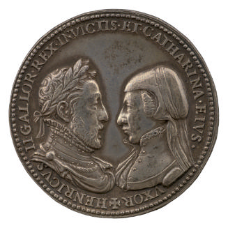 Silver portrait medal of Henri II laureate in armor and a commander’s cape, knotted on the shou…