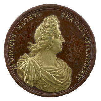 Partially gilt bronze medal of a man in profile to the right with long, curled hair, wearing ar…