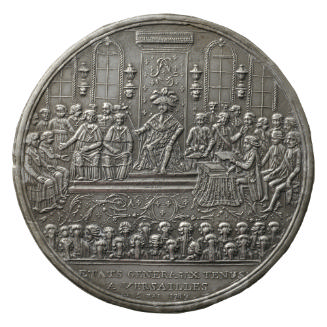 Tin medal depicting Louis XVI in full regalia seated on a throne surrounding by various represe…