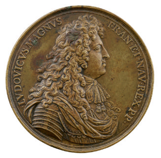 Bronze medal of a man in profile to the right in a periwig, lace cravat, commander’s sash, and …