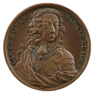 Bronze medal of a man wearing armor, the livery collar and medal of the Supreme Order of the Mo…