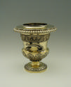 Gilt silver wine cooler with branch handles and family crest, side view