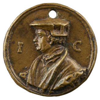 Copper medal of a man wearing an academic gown and a low hat with turned-up brim
