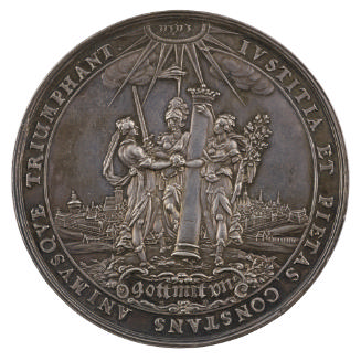 Silver medal depicting three figures gathered around a pillar