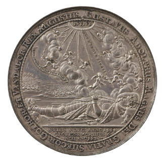 Silver medal depicting the body of a deceased king, crowned and in full armor, lying on a battl…