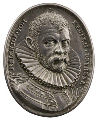 Silver medal of man wearing a ruff