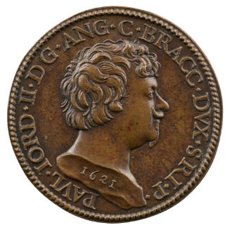 Bronze medal of a medal in profile to the right