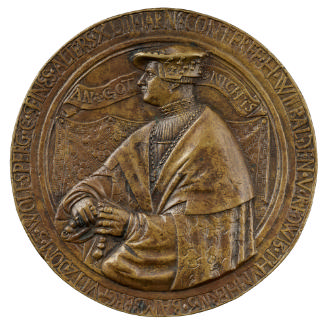 Bronze medal of a man wearing a hat, a pleated shirt, a rich cape, and a chain and holding a ro…