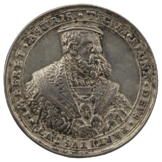 Silver medal of man wearing hat and collar of the Order of the Golden Fleece
