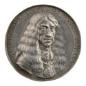 Silver portrait medal of Charles II, King of England with long hair and thin mustache, wearing …