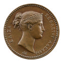 Bronze medal of a woman in profile to the right