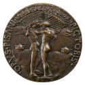 Bronze medal of two nude men holding large baskets filled with plants on their heads with rainc…