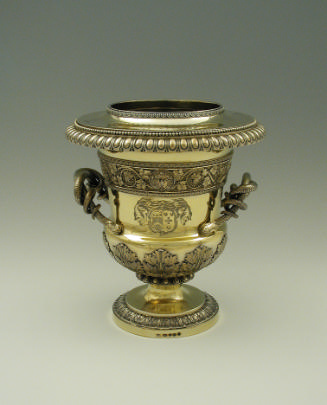 Gilt silver wine cooler with branch handles and family crest