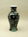 Alternate view of black ground porcelain vase with branches and white flowers