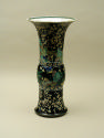 Alternate view of porcelain vase in bronze form with black ground and floral and vegetal design…
