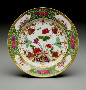 large dish with green border and floral decoration