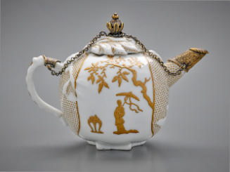 Teapot with gilt mounts and asian scenes in gold