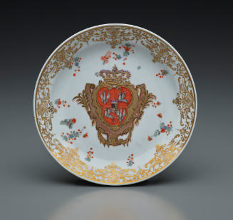 plate with large coat of arms in the center