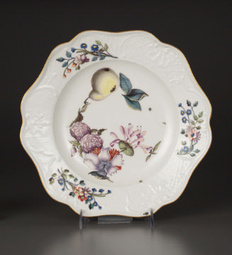 Plate with painted fruit and floral decoration