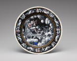 Black painted enamel dish depicting Saturn on a chariot
