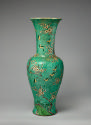 Alternate view of tall porcelain vase with green ground and floral and vegetal designs