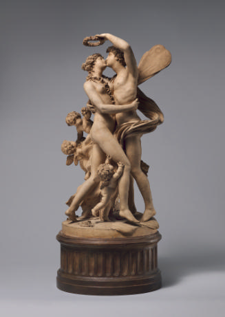 Terracotta sculpture of Zephyrus and Flora.  The two figures are sharing a kiss, Zephyrus is in…