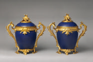 Pair of blue hard-paste porcelain and gilt bronze mounted covered jars