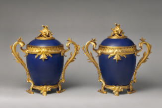 Pair of blue hard-paste porcelain and gilt bronze mounted covered jars