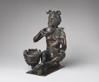 Bronze sculpture of a satyr with an inkstand, candlestick holder and a bowl lifted up to his li…