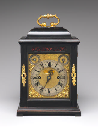Front view of Bracket Clock with gilt bronze elements such as the handle, keyhole and decorativ…