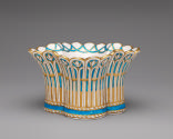 Porcelain basket-shaped dish in blue, white, and gold