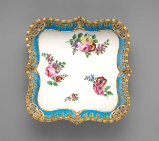Porcelain square tray in blue, white, and gold with floral designs