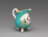 Alternate view of porcelain milk jug in blue and gold with image of bird in water
