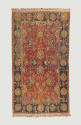 Dark red and dark blue rectangular Persian rug with floral design