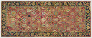 Red Rectangular Persian rug with floral design and a blue border