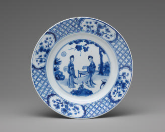 Blue and white porcelain plate with two standing women