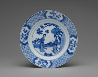 Blue and white porcelain plate with two standing women