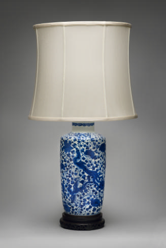 Blue and white porcelain vase lamp with plant and animal design