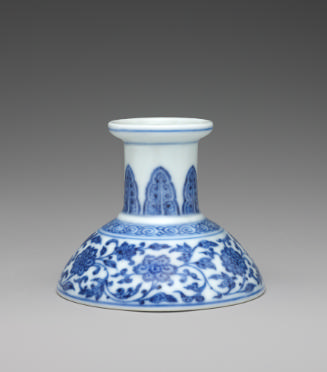 Blue and white hard-paste porcelain low candlestick with underglaze blue foliage decoration