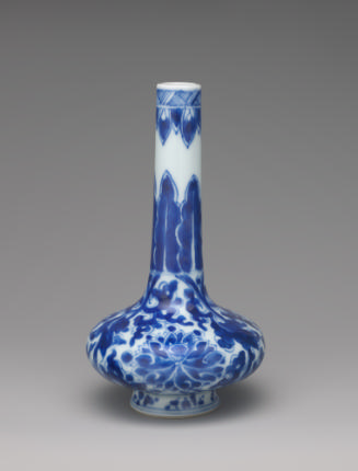 White hard-paste porcelain bottle-shaped vase with underglaze blue foliage decoration