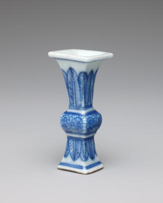 White hard-paste porcelain square beaker-form vase with underglaze blue foliage decoration