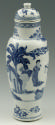 Blue and white porcelain covered jar with figures in a landcape. 