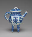 Alternate view of white hard-paste four-legged vessel with spout and handle and underglaze blue…