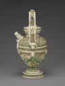 Side view of painted porcelain ewer with spout at the center