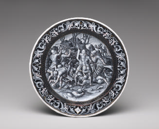 Black painted enamel dish depicting a battle scene of Jason confronting the giants