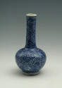 White hard-paste porcelain bottle-shaped vase with underglaze blue decoration, side view