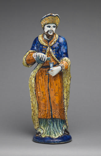 Anthropomorphic pitcher of a man painted in color